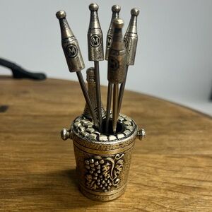 Vintage Spain pewter appetizer set. Wine bottle and grape vine design.